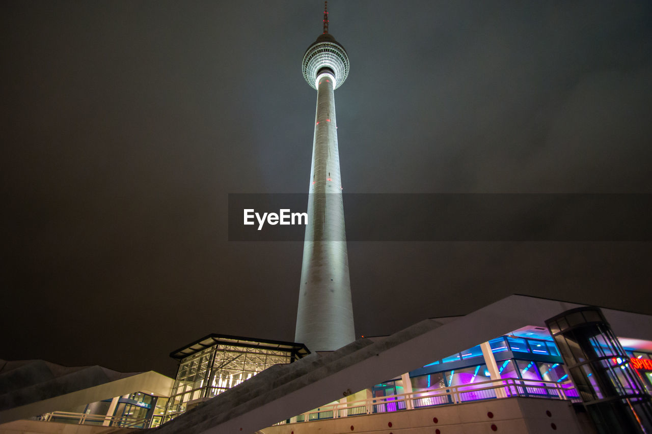 LOW ANGLE VIEW OF COMMUNICATIONS TOWER AGAINST SKY