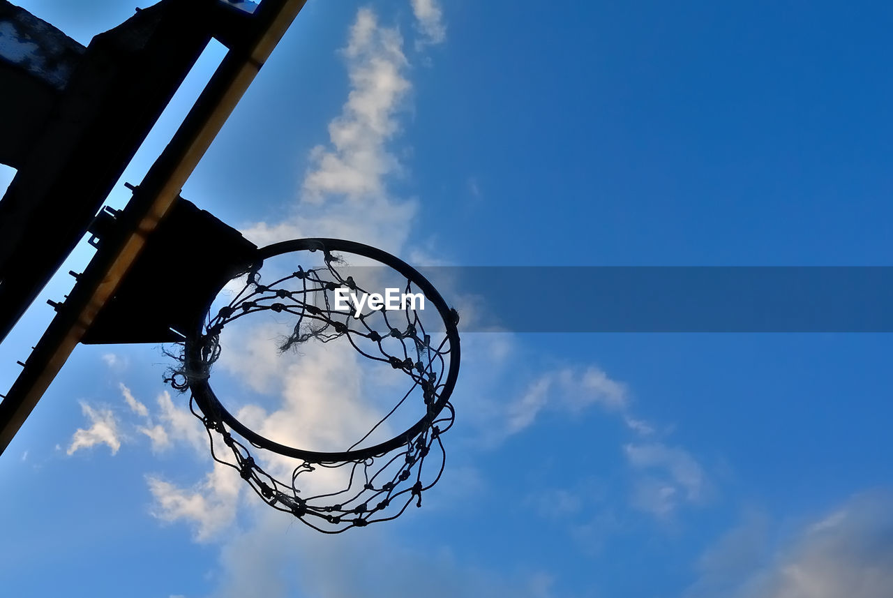 LOW ANGLE VIEW OF BASKETBALL HOOP