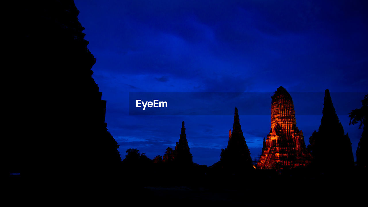 SILHOUETTE OF TEMPLE AGAINST SKY