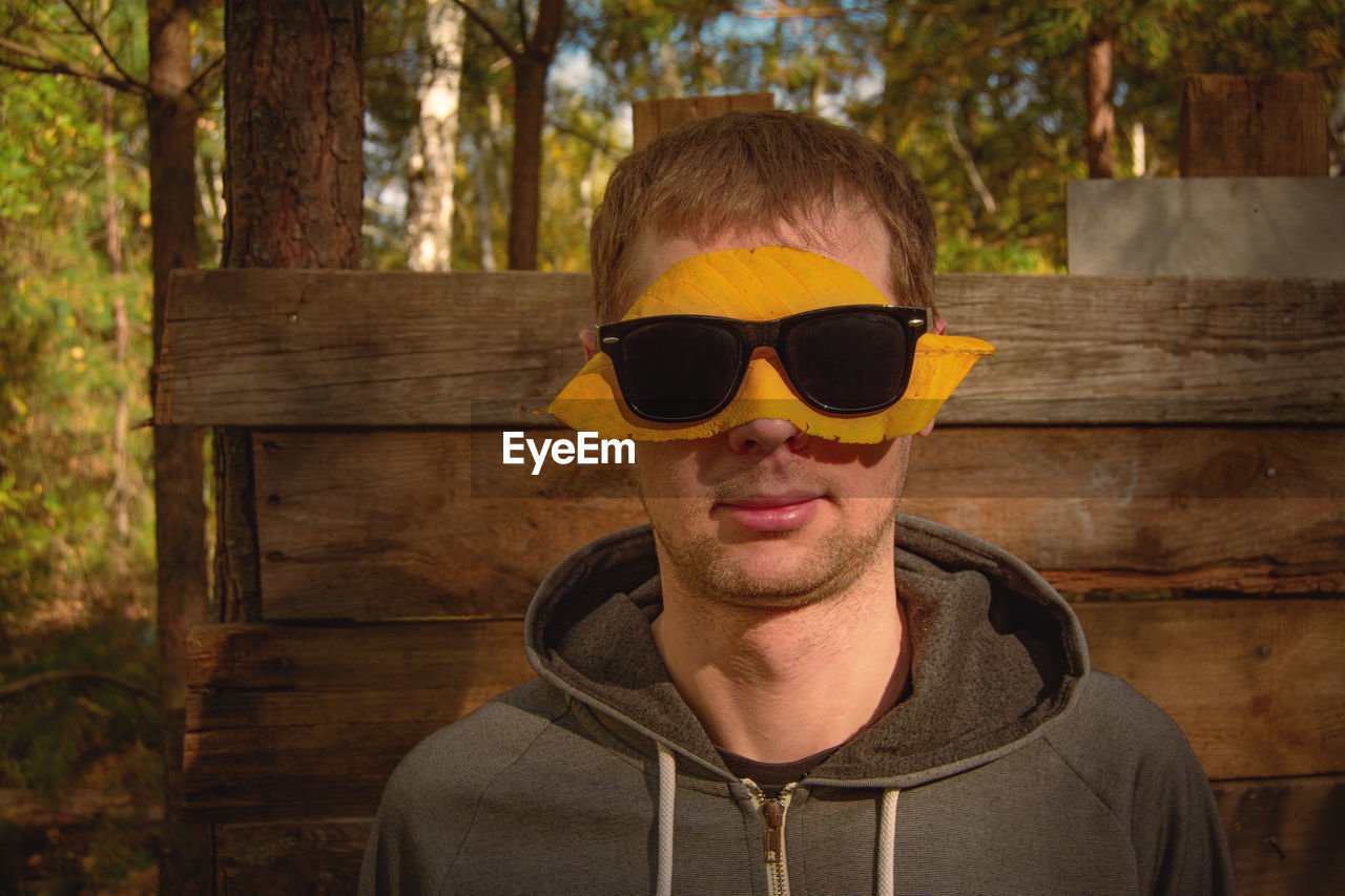 Portrait of young man wearing sunglasses