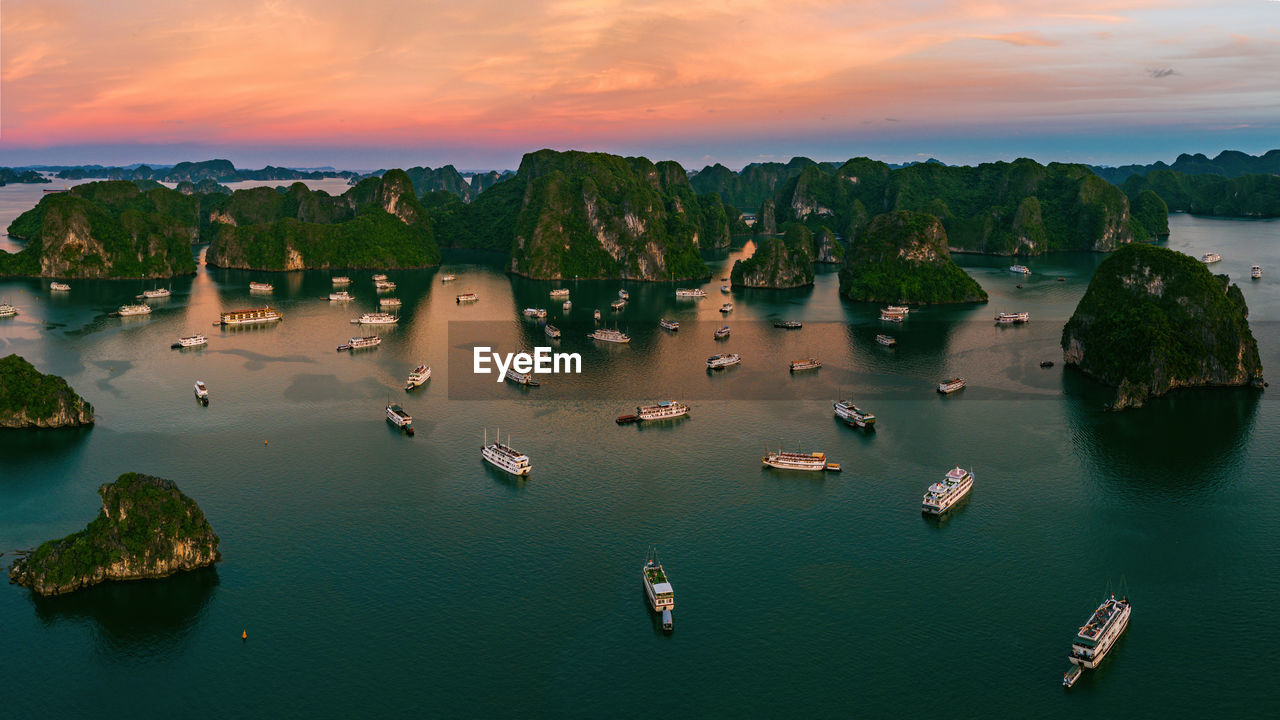 High angle view of sea against sky during sunset