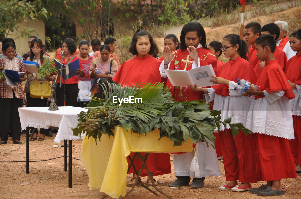 People during palm sunday mass