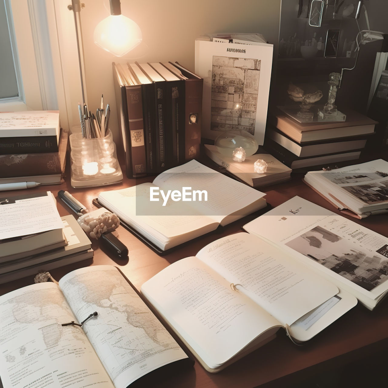 book, indoors, room, table, furniture, publication, paper, document, desk, no people, technology, interior design, office, education, business, lighting equipment, home, home interior