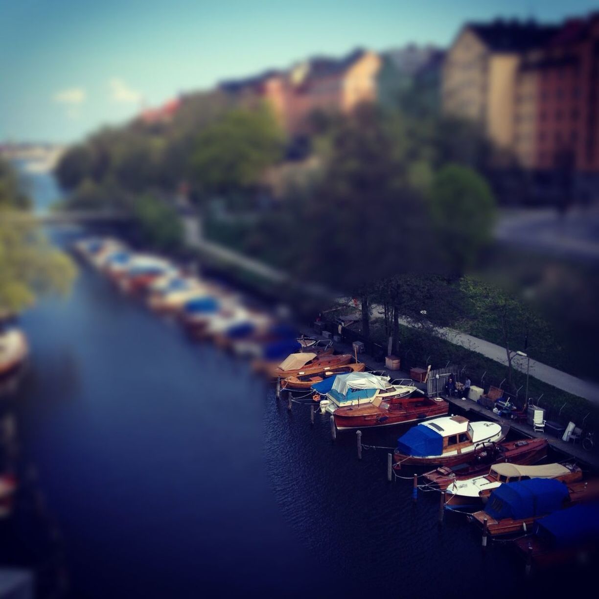 BOATS MOORED IN HARBOR