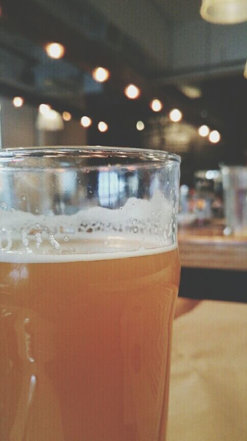 CLOSE-UP OF DRINK ON TABLE