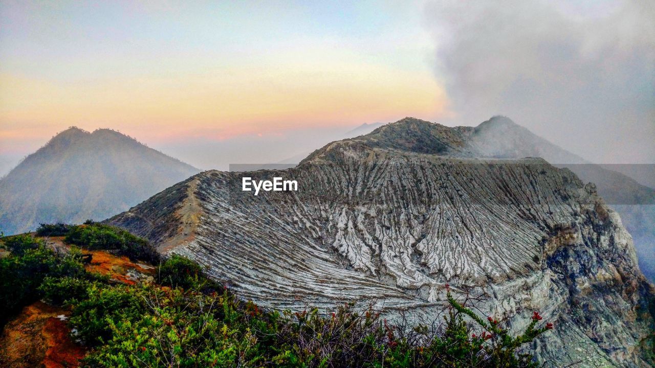 Scenic view of volcano mountain againts sky