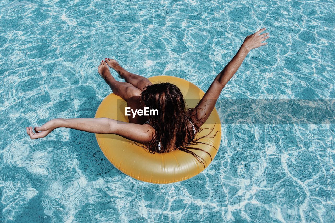 High angle view of woman in swimming pool