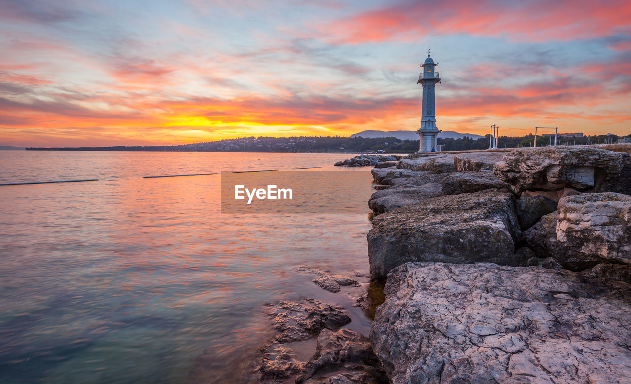 Scenic view of sea at sunset