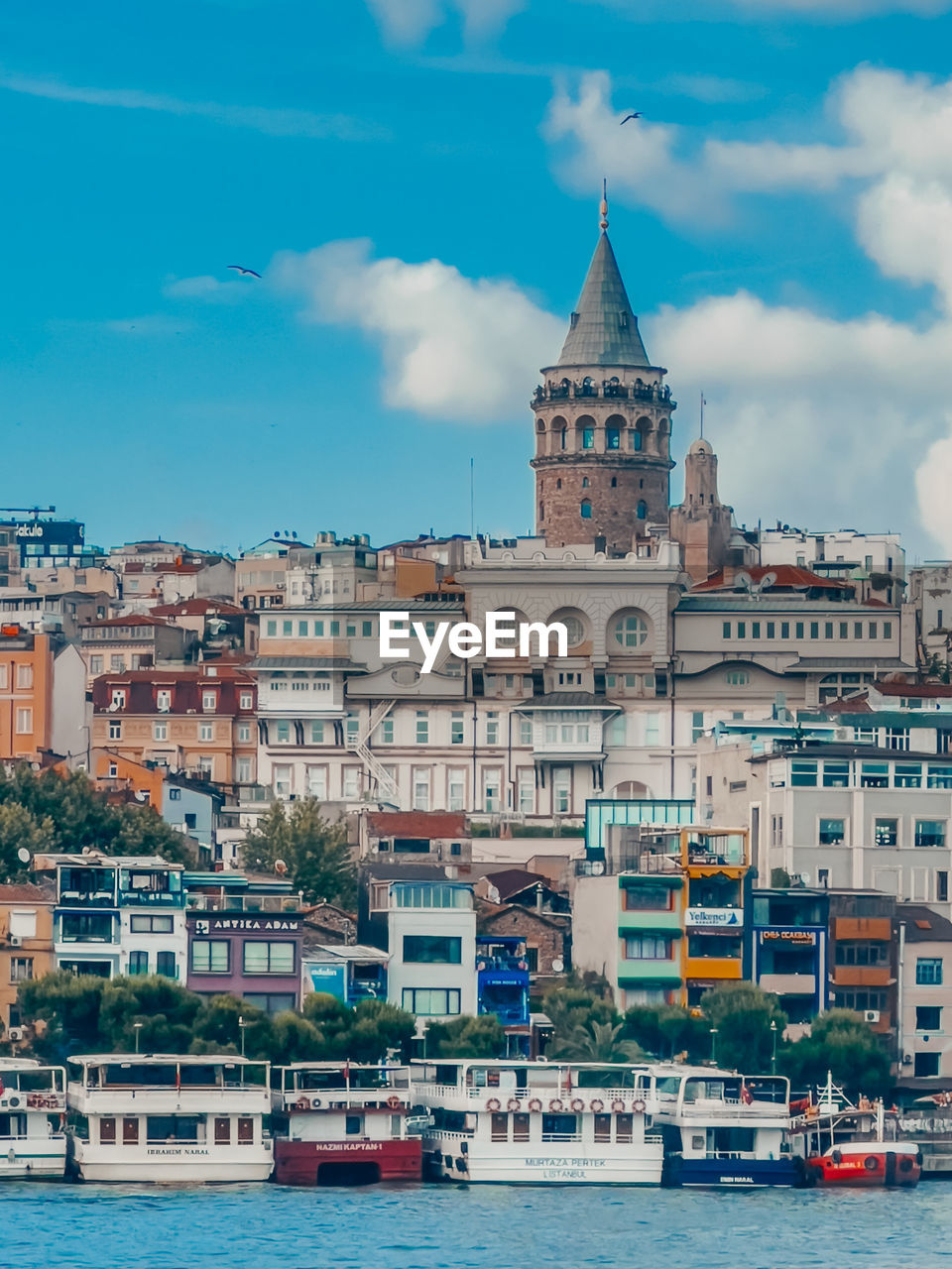 architecture, building exterior, built structure, city, building, water, cityscape, travel destinations, sky, nautical vessel, transportation, travel, town, nature, mode of transportation, sea, cloud, harbor, ship, tourism, tower, vehicle, boat, place of worship, residential district, no people, religion, coast, skyline, day, watercraft, the past, history, waterfront, vacation, outdoors, land, waterway, house, old, craft, landscape, blue, landmark, city life, holiday