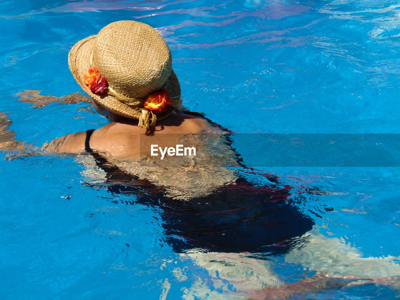 Woman swimming in pool