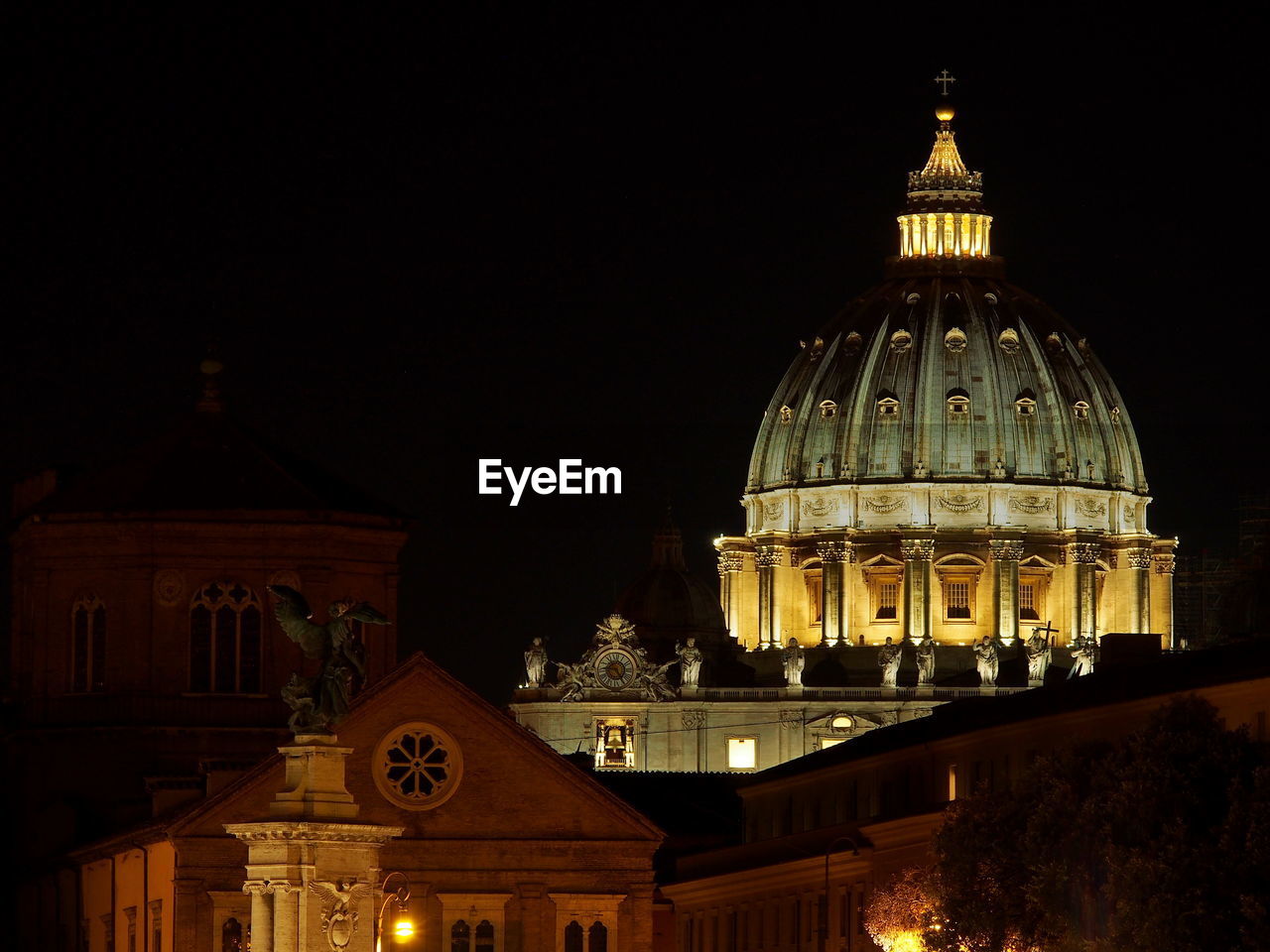 LOW ANGLE VIEW OF ILLUMINATED CATHEDRAL