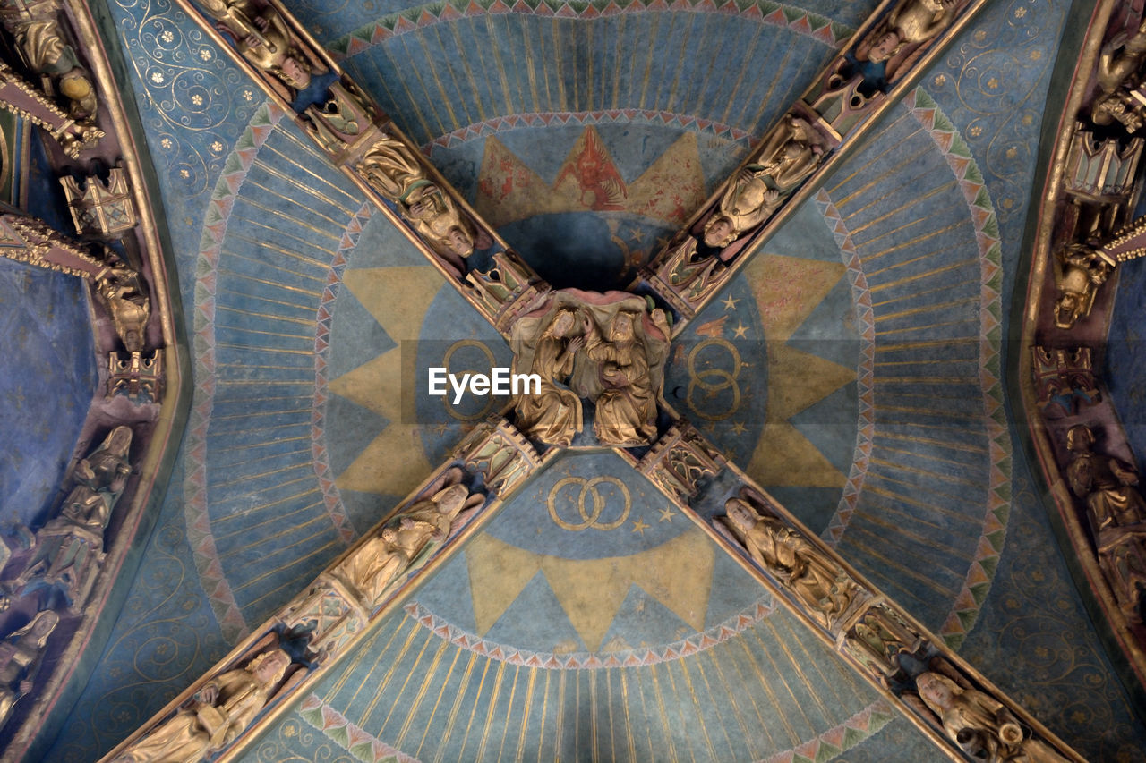 Full frame shot of sculptures on ceiling in church