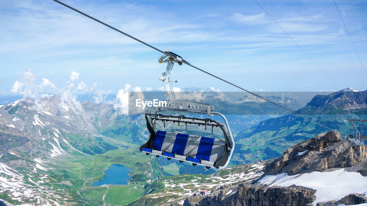 Overhead cable car against mountains