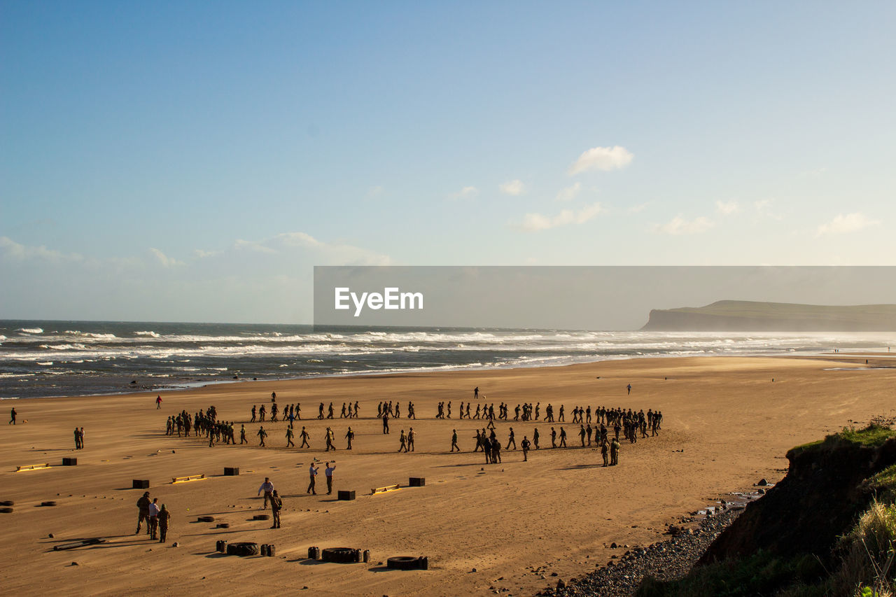 Group of people on beach british army