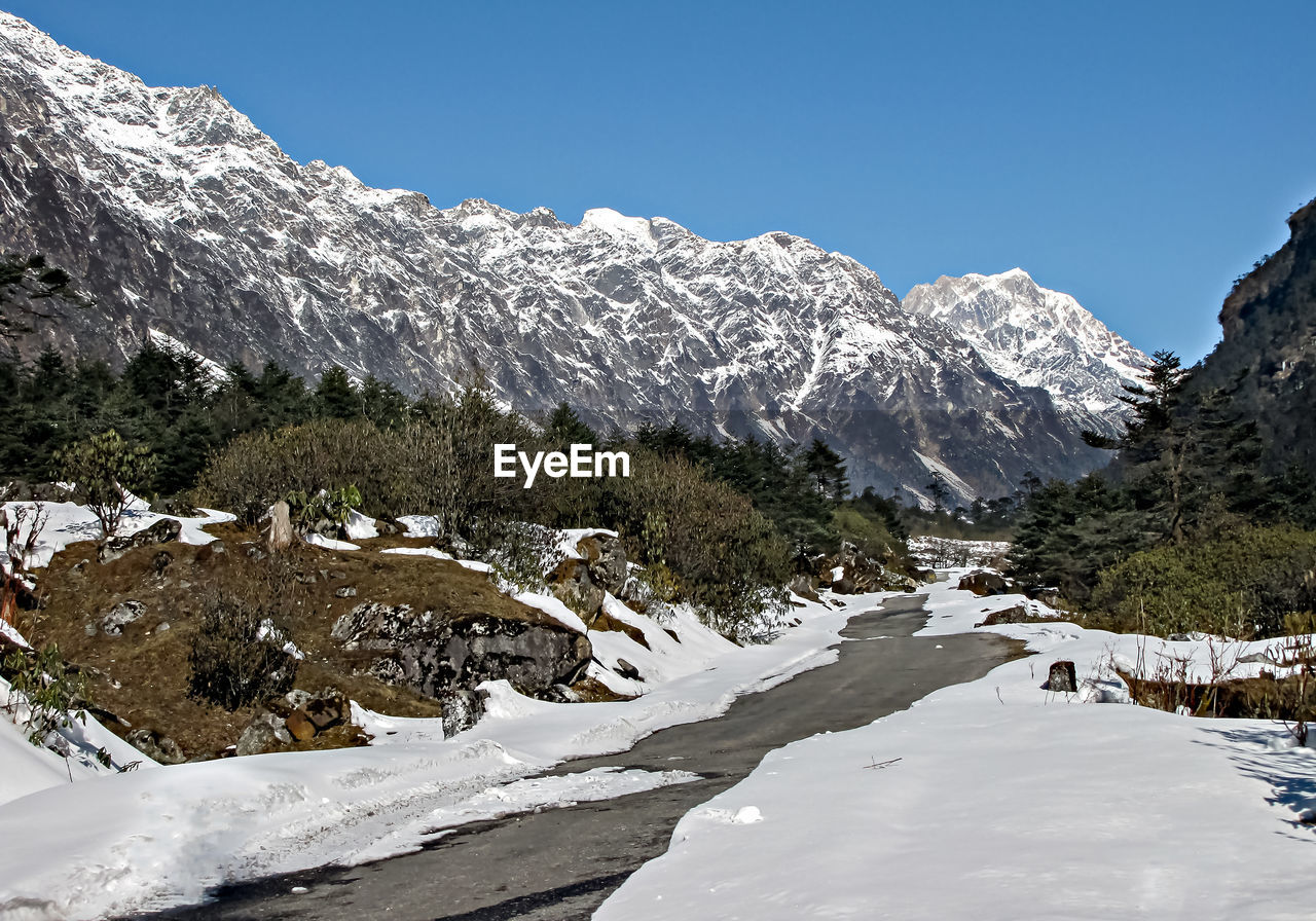Snow covered road to zero point in yumthang valley of gangtok, sikkim, india