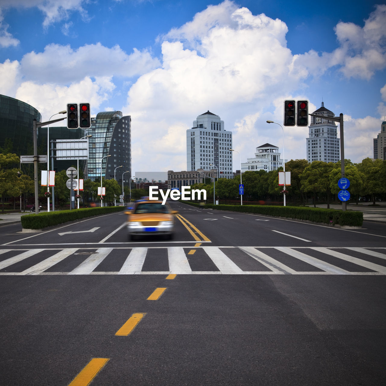 SURFACE LEVEL OF ROAD BY BUILDINGS AGAINST SKY