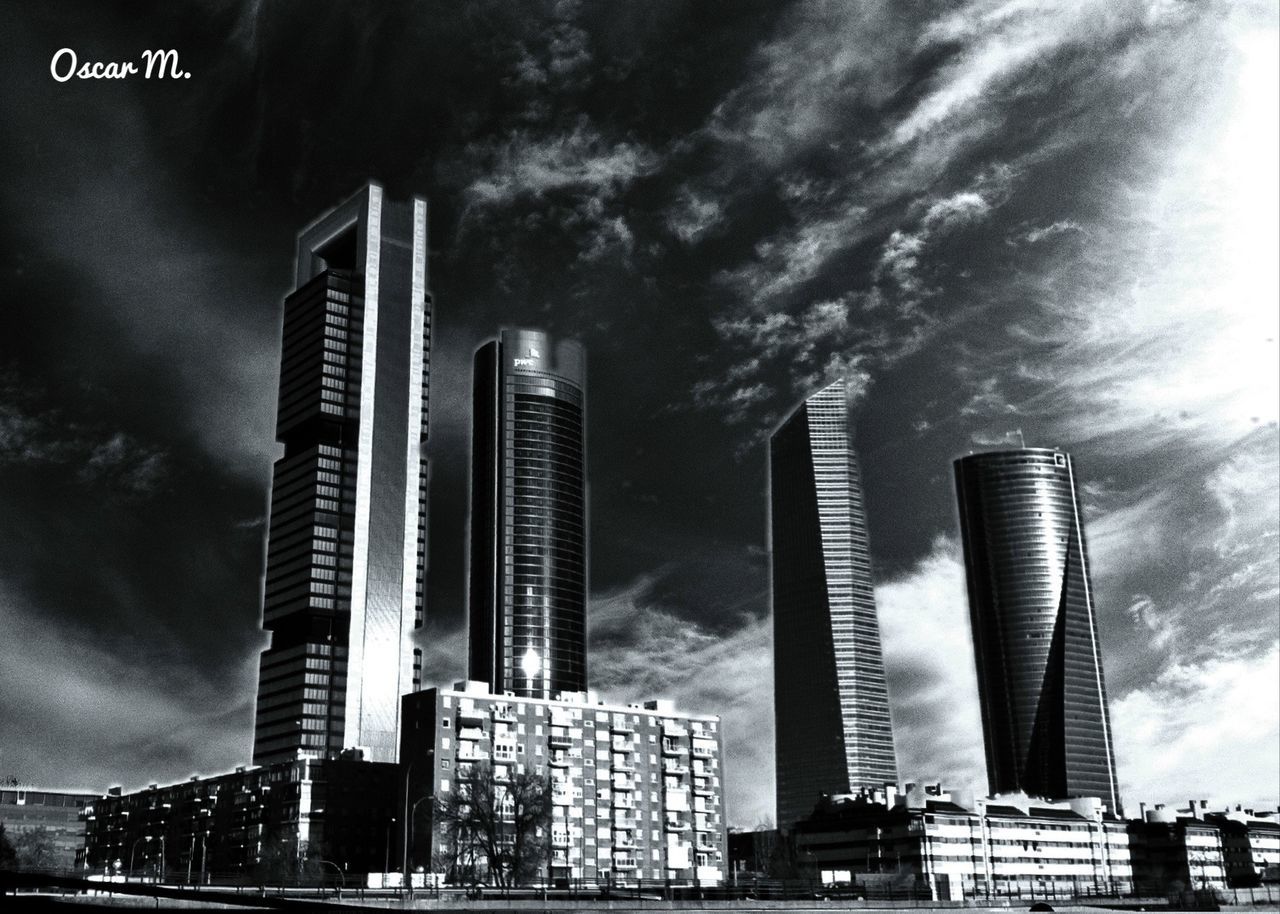 SKYSCRAPERS AGAINST SKY IN CITY
