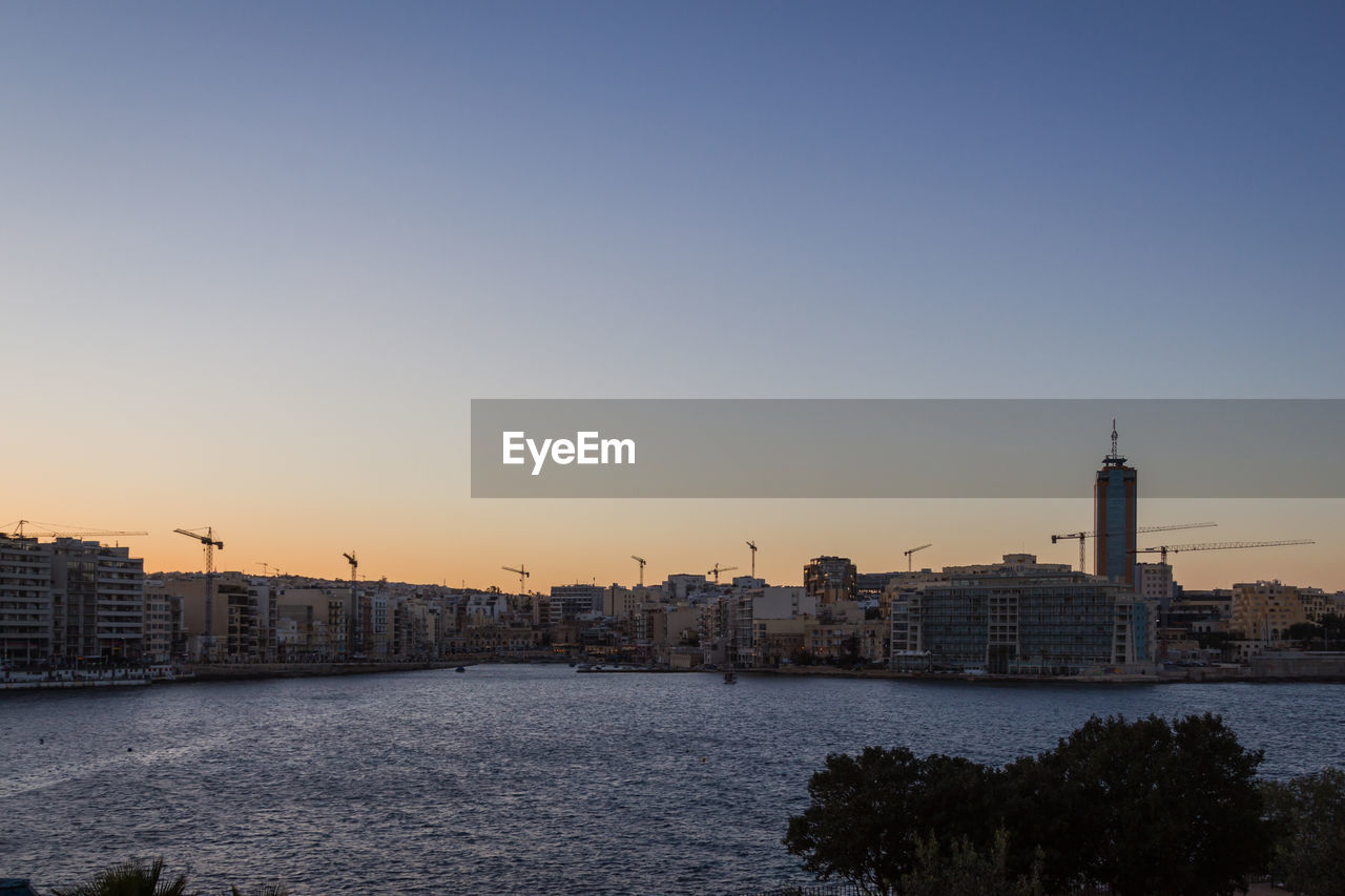 VIEW OF RIVER AT SUNSET