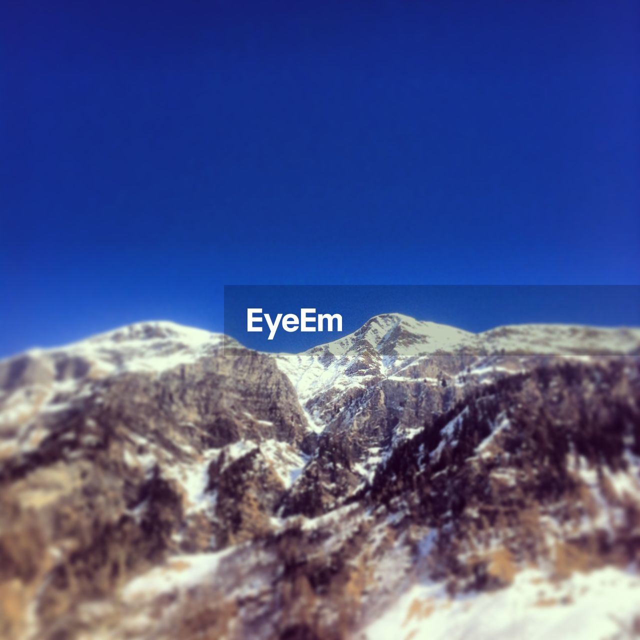 Scenic view of mountains against clear sky