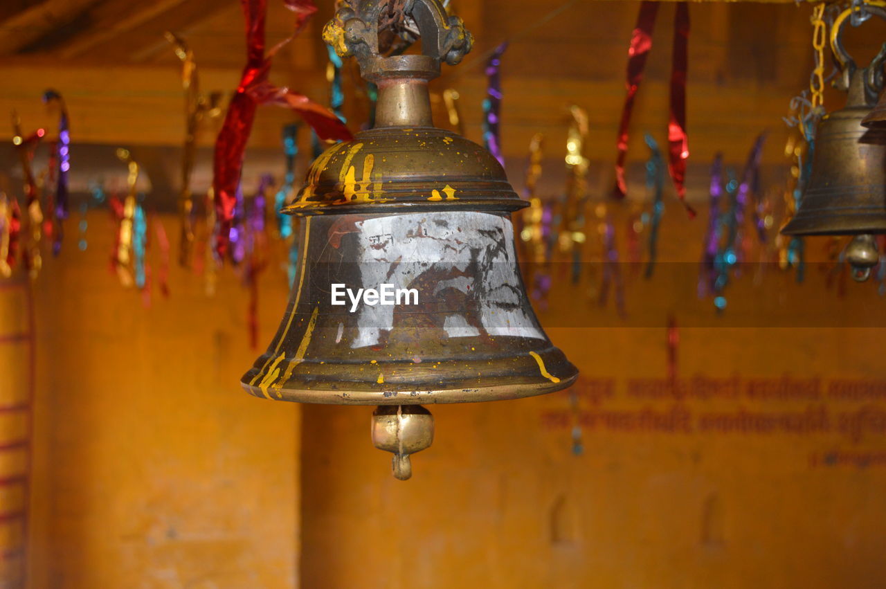 Close-up of old bell hanging