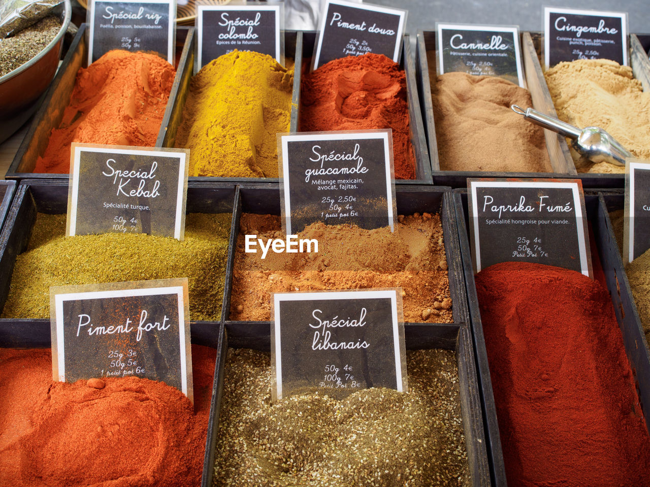 Variety of spices for sale at market stall