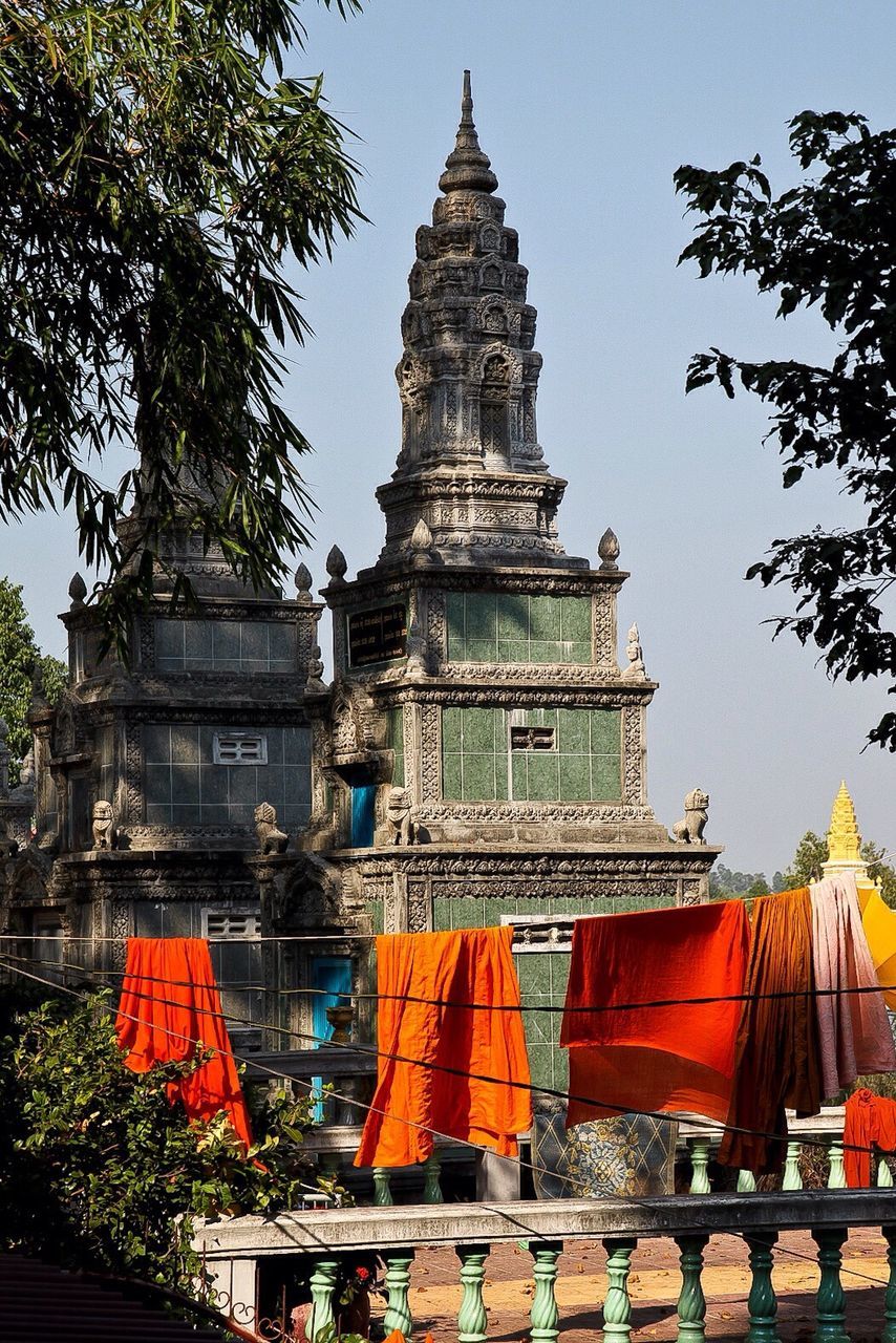 Laundry on clothesline in front of old towers