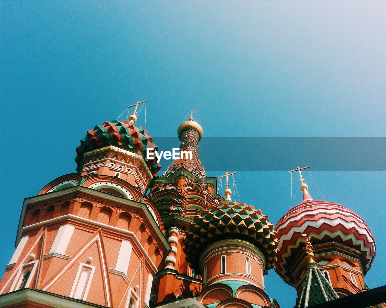 Low angle view of st basil cathedral at moscow kremlin against clear sky