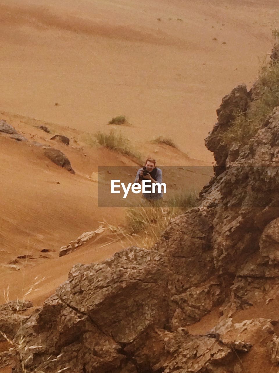 WOMAN STANDING ON LANDSCAPE