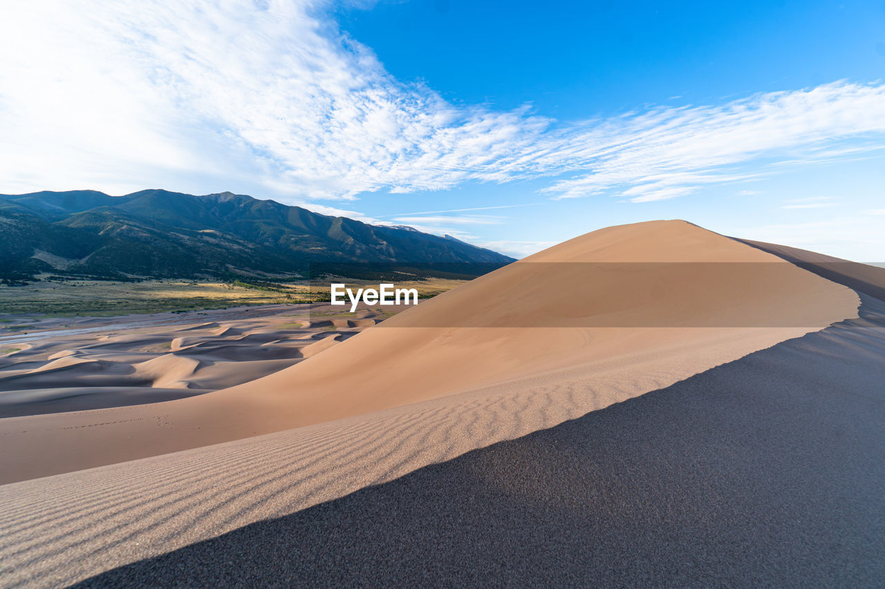 Rim of a sand dune at great sand dunes national park colorado