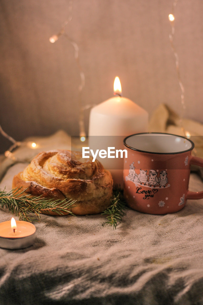 TEA LIGHT CANDLE ON TABLE