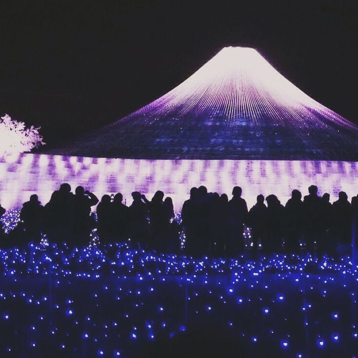 LOW ANGLE VIEW OF ILLUMINATED BUILT STRUCTURE