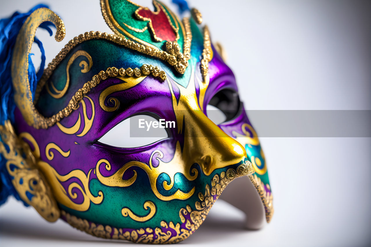 clothing, masque, disguise, mask, mask - disguise, costume, multi colored, headgear, human head, close-up, tradition, ornate, carnival, single object, craft, celebration, arts culture and entertainment, venetian mask, studio shot, indoors, human face, mystery, representation