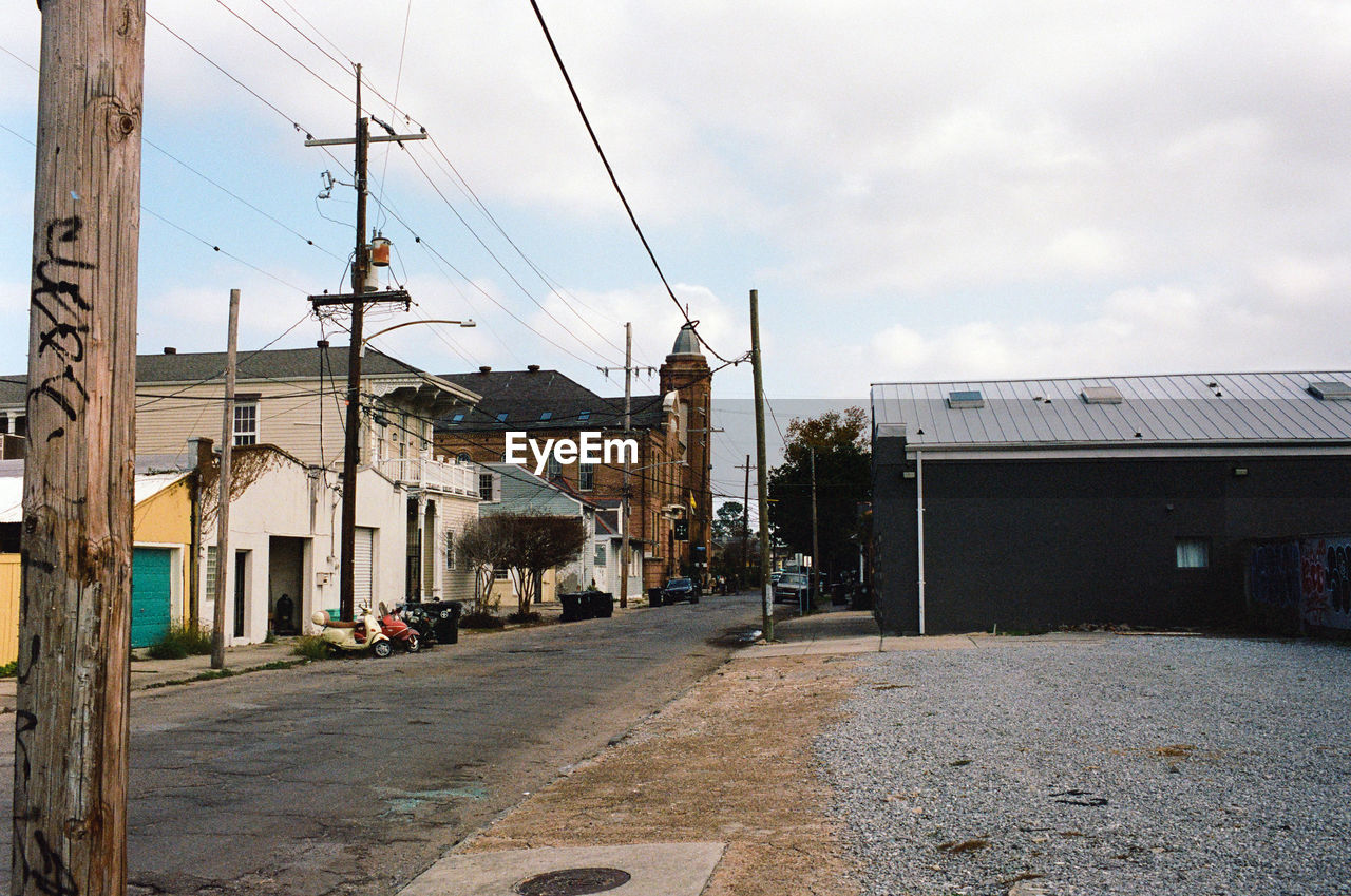 road amidst buildings in city