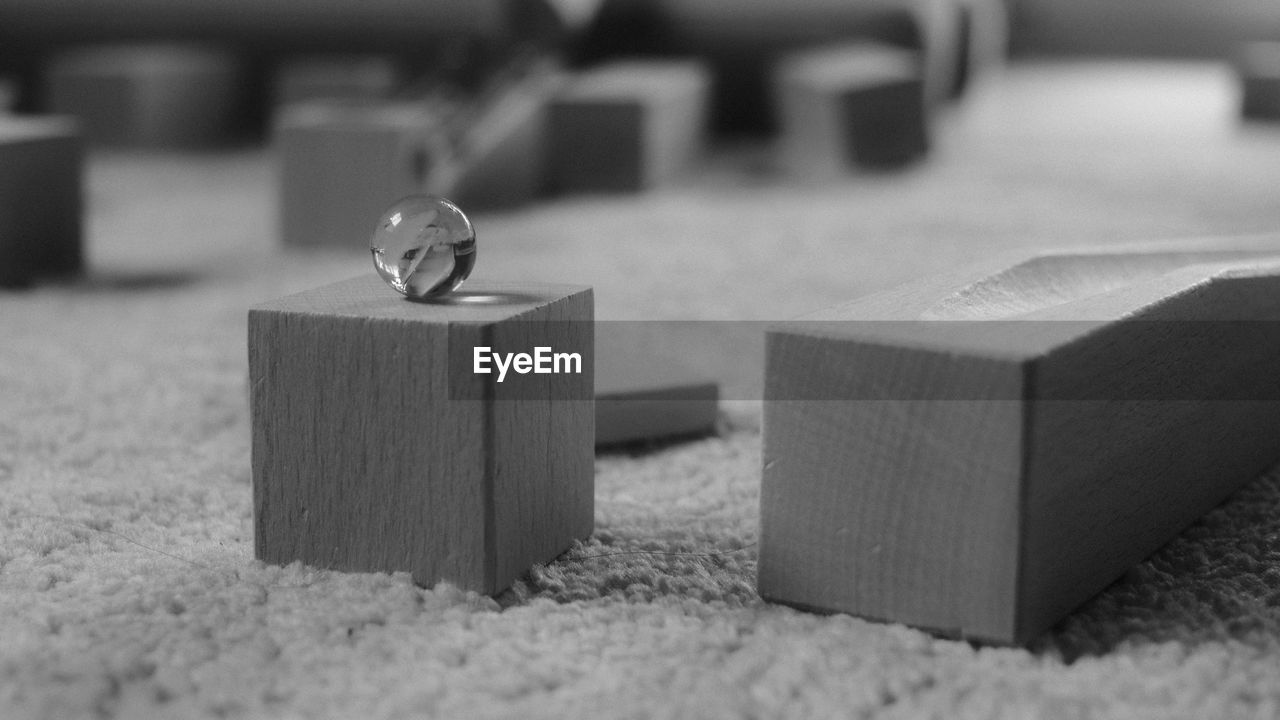 CLOSE-UP OF TOY TOYS ON TABLE