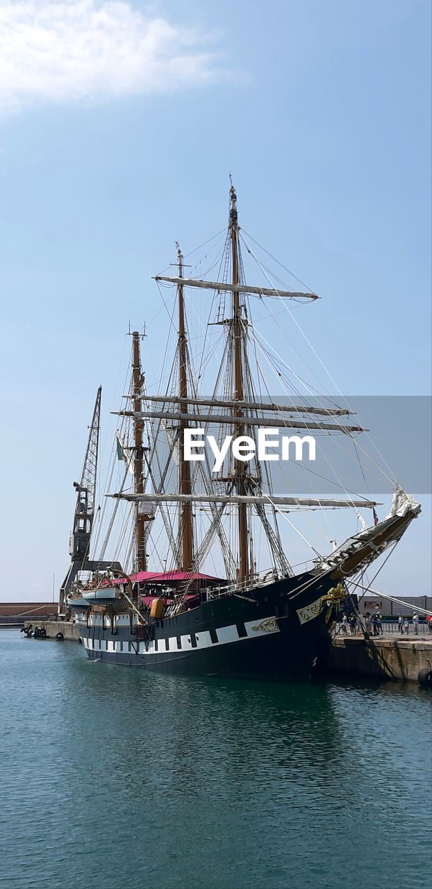 nautical vessel, water, transportation, vehicle, mode of transportation, sea, ship, sailboat, sailing ship, tall ship, sailing, sky, nature, mast, history, boat, pole, the past, travel, galleon, architecture, watercraft, no people, frigate, day, cloud, windjammer, blue, outdoors, schooner, harbor, barquentine, passenger ship, travel destinations
