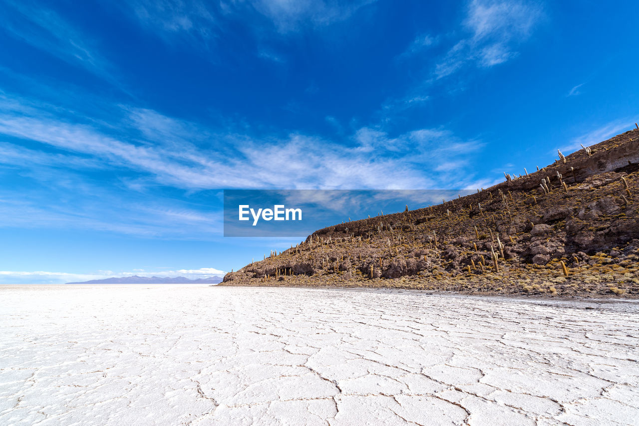 Scenic view of salar de uyuni against sky