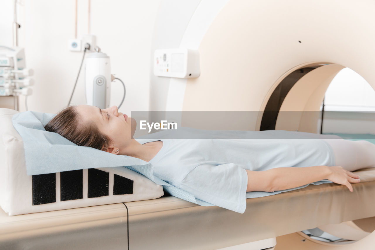 Medical ct or mri scan with a patient in the modern hospital laboratory. interior of radiography 