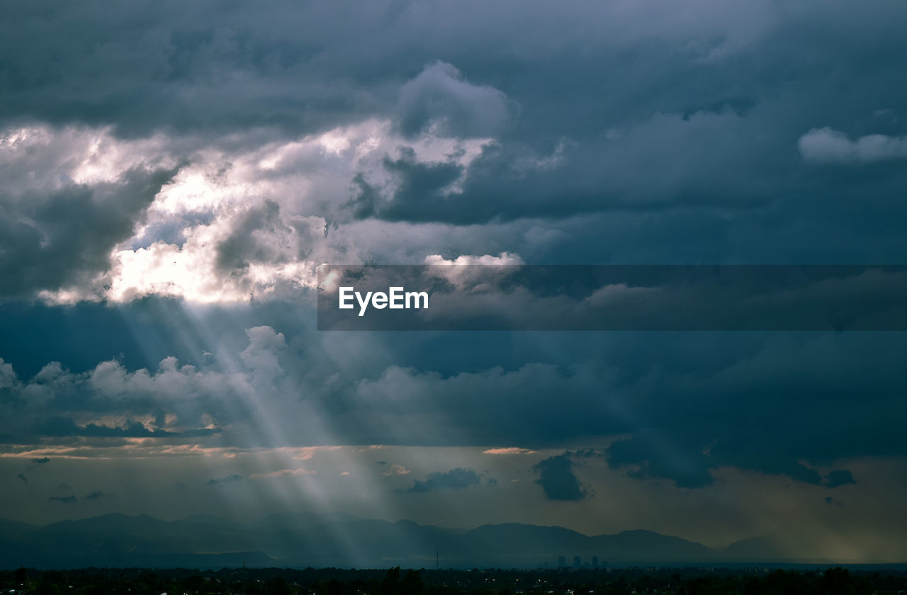 Low angle view of clouds in sky during sunset