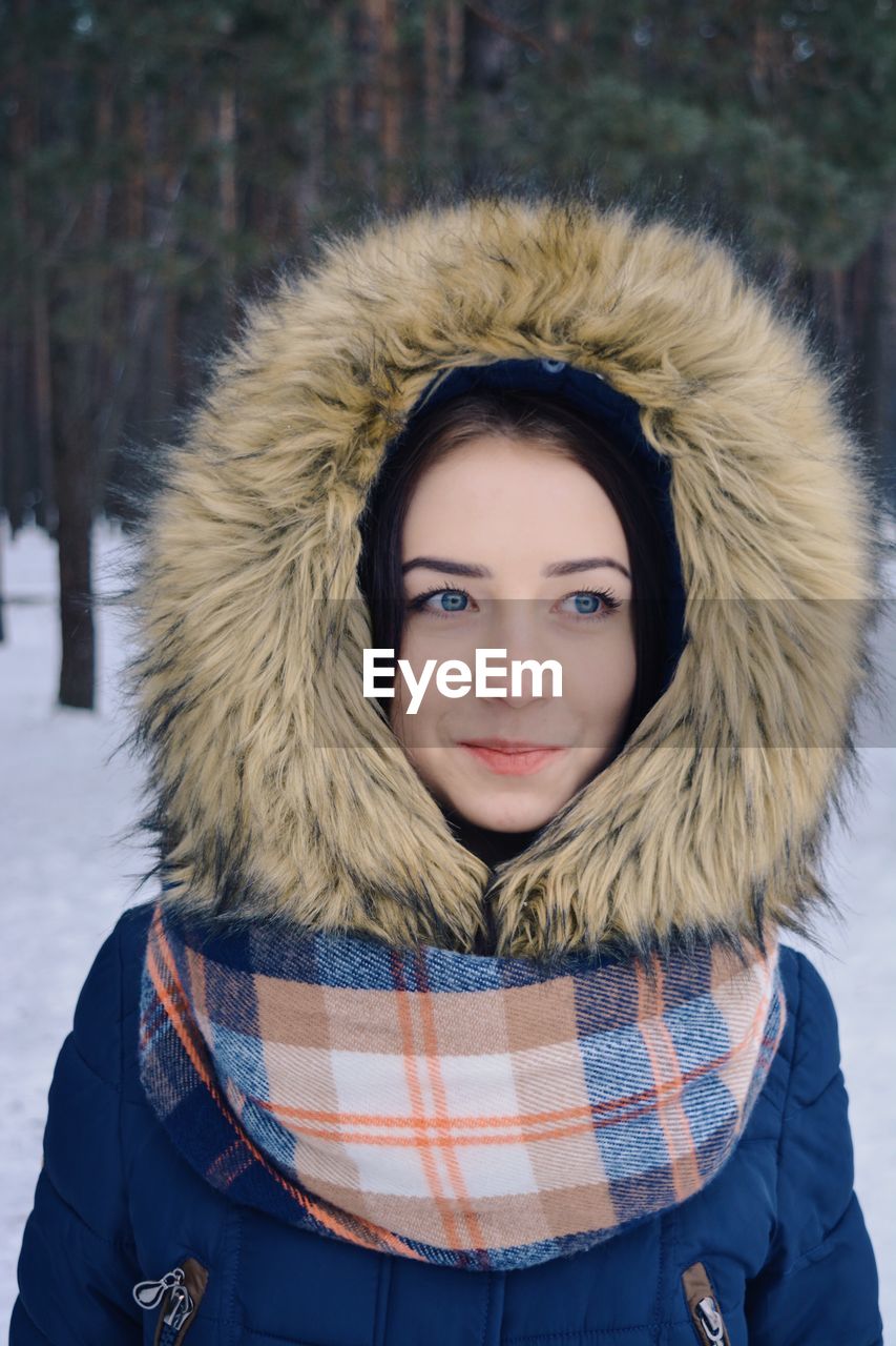 Portrait of young woman in winter