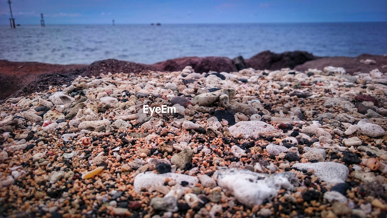 SURFACE LEVEL OF STONES ON BEACH