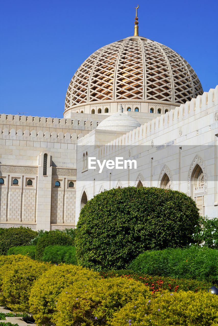 View on sultan qaboos grand mosque by clear blue sky