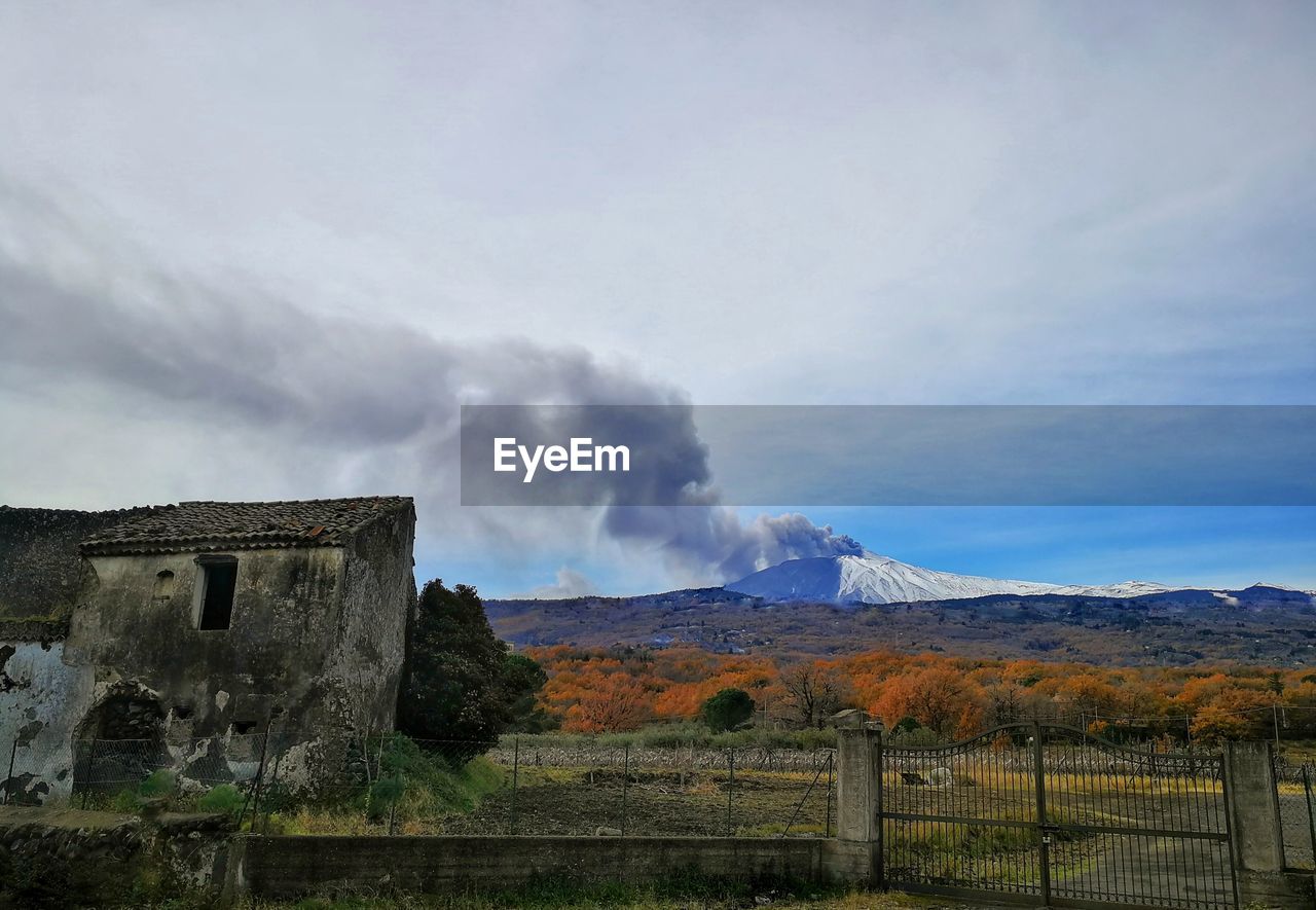 Scenic view of landscape against sky. mount etna volcano 