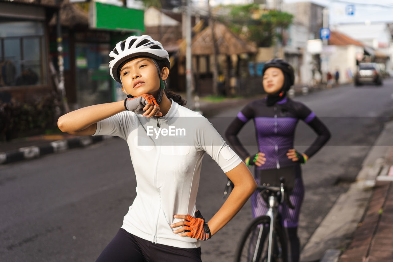 Female cyclist on road