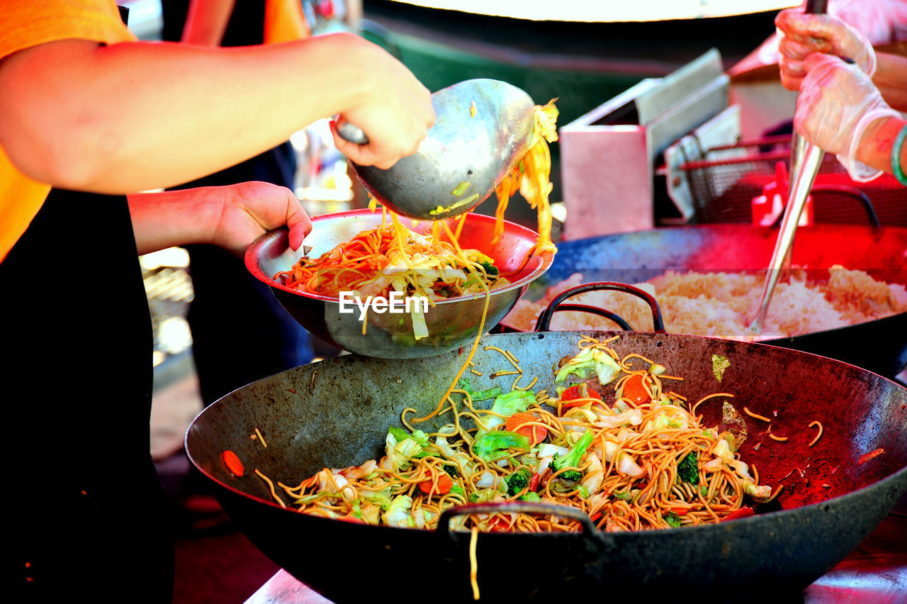 Asian stir fry cooking outdoors.