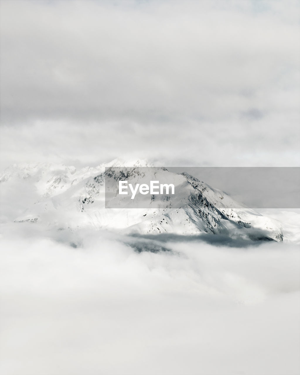 Scenic view of snow capped mountain against sky