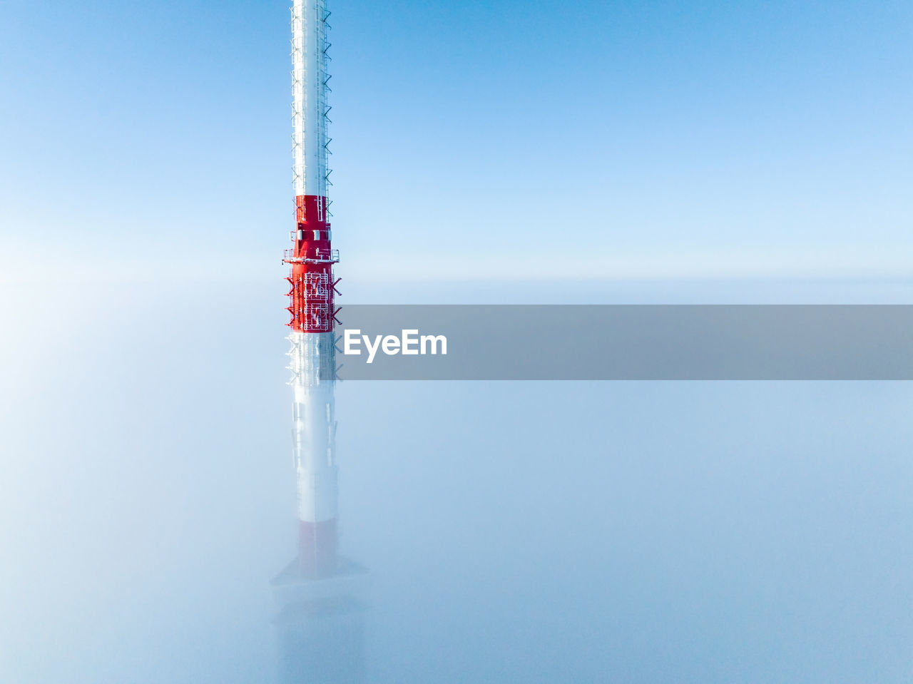 Aerial drone top view of the riga tv tower in latvia.