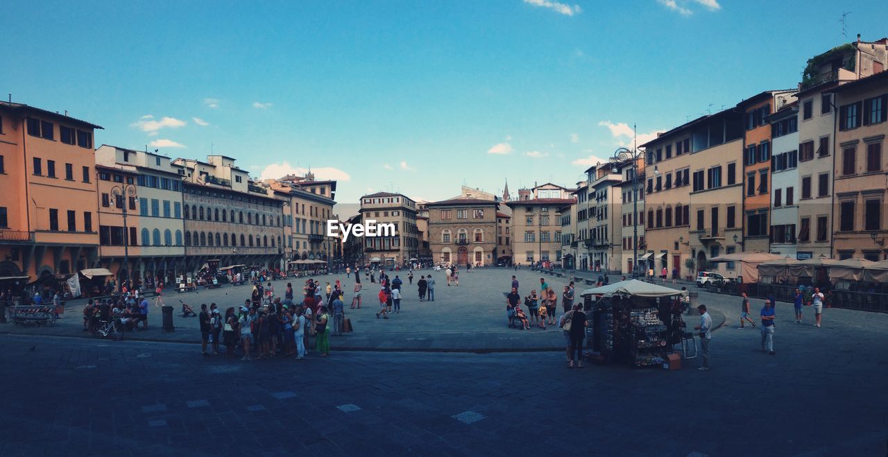 PEOPLE ON STREET IN CITY