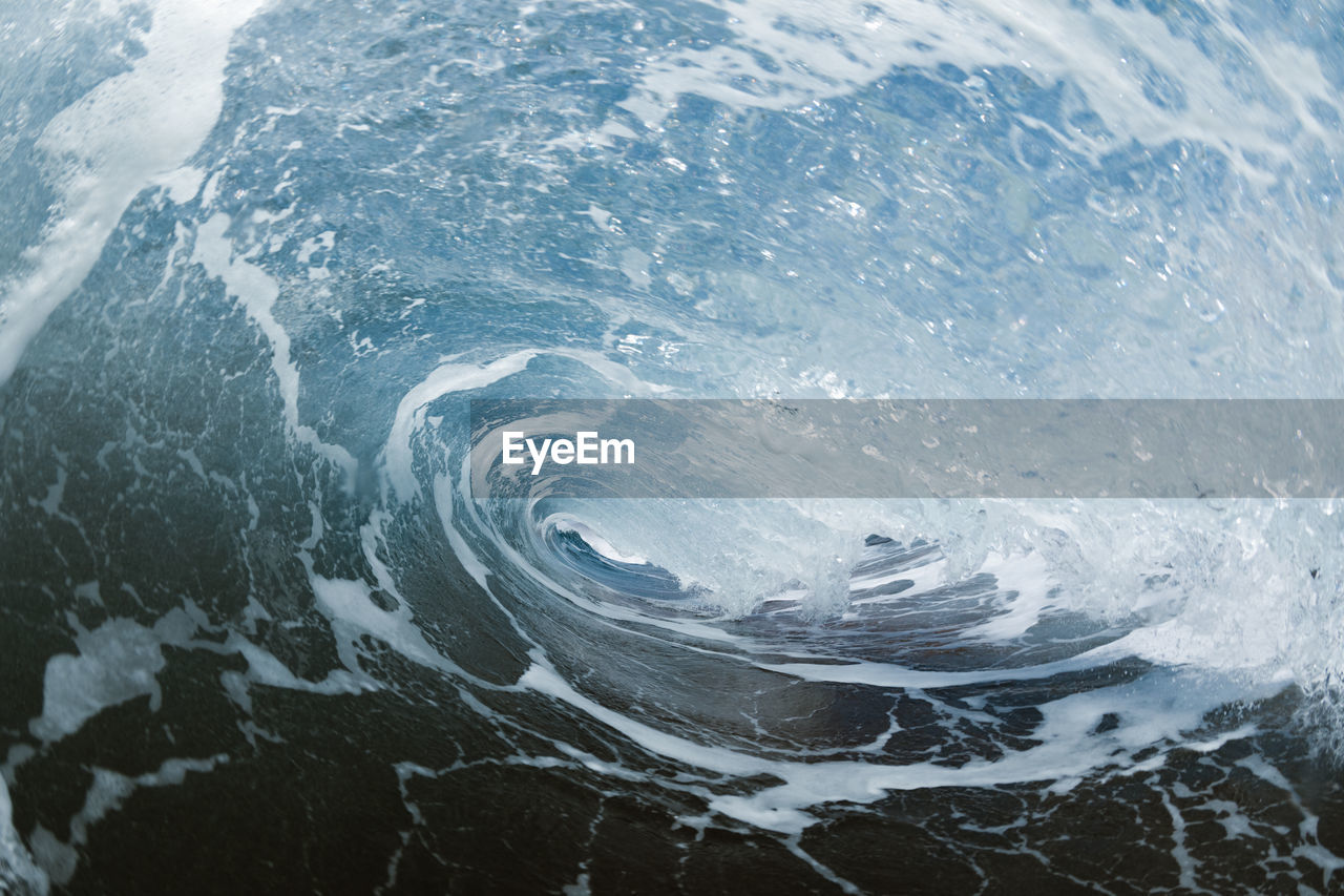 Close-up of waves splashing in sea