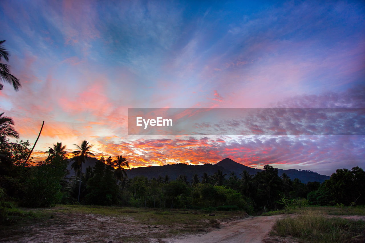 Scenic view of dramatic sky during sunset