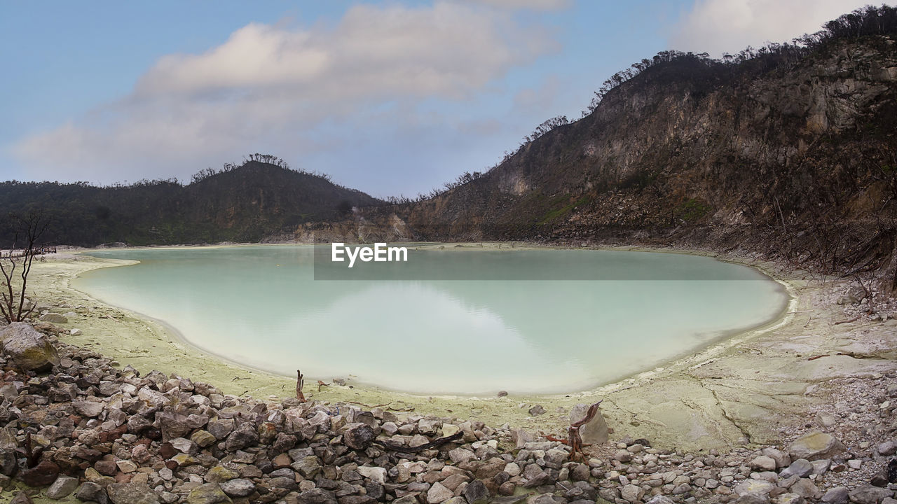 Kawah putih or white crater is sulfur volcanic crater lake in ciwidey, bandung, west java, indonesia